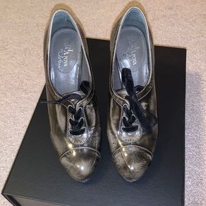Black Cole Haan patent leather Oxford pumps